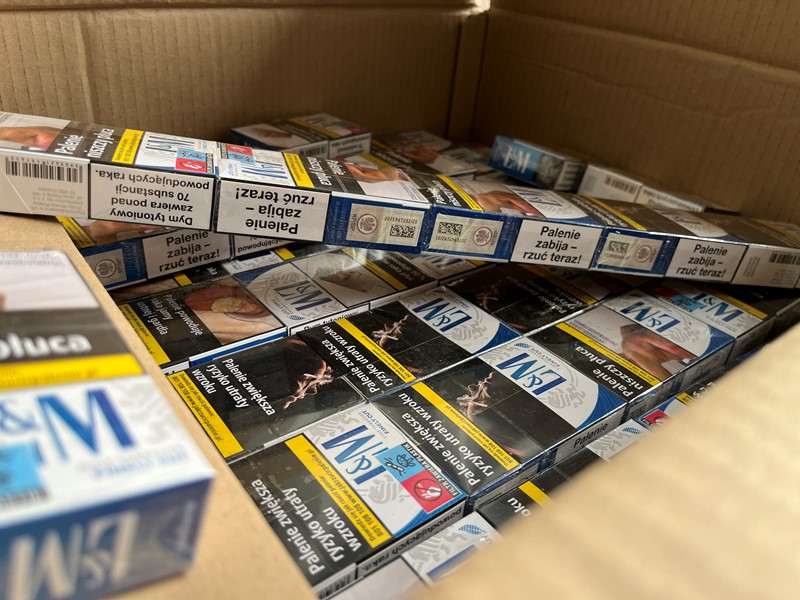 A box full of packets of cigarettes seized during a raid in Sheffield